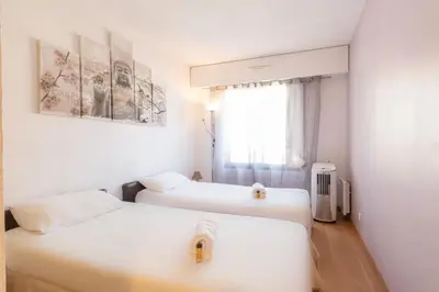 Un ou plusieurs lits dans un hébergement de l'établissement Quartier Vauban 2 bedroom apartment