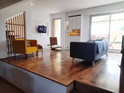 Coin salon dans l'établissement Appt 70m2, 3P, Toit-terrasse, Vue mer, Proche plage
