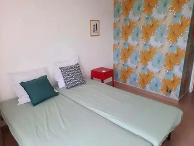 Un ou plusieurs lits dans un hébergement de l'établissement Appt 70m2, 3P, Toit-terrasse, Vue mer, Proche plage