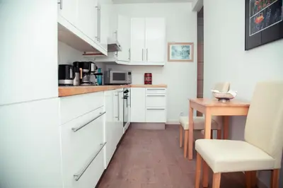 Cuisine ou kitchenette dans l'établissement AnaZa Appartement