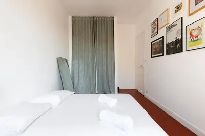Un ou plusieurs lits dans un hébergement de l'établissement IMMOGROOM - Bright flat - near shops - CONGRESSBEACHES