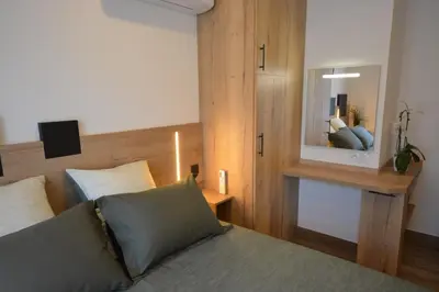 Un ou plusieurs lits dans un hébergement de l'établissement Les villas du Golf Mougins