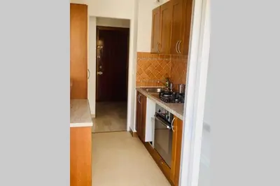 Cuisine ou kitchenette dans l'établissement T2 appartement Golfe Juan 47m2 plages et port
