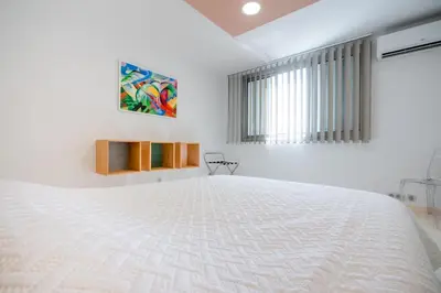 Un ou plusieurs lits dans un hébergement de l'établissement 2-Bedroom apartment in Grand Hotel