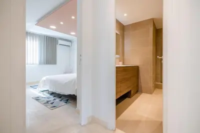 Un ou plusieurs lits dans un hébergement de l'établissement 2-Bedroom apartment in Grand Hotel
