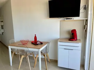 Cuisine ou kitchenette dans l'établissement Superbe Studio Le pavois