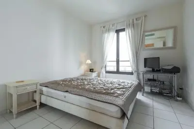 Un ou plusieurs lits dans un hébergement de l'établissement Cannes centre 2mins from beach stunning 3-Bed Apt