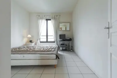 Un ou plusieurs lits dans un hébergement de l'établissement Cannes centre 2mins from beach stunning 3-Bed Apt