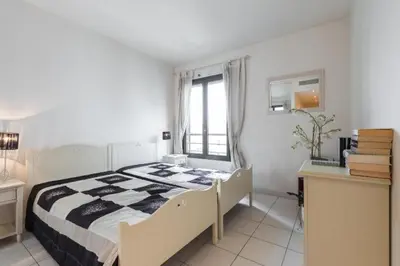 Un ou plusieurs lits dans un hébergement de l'établissement Cannes centre 2mins from beach stunning 3-Bed Apt
