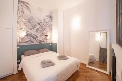 Un ou plusieurs lits dans un hébergement de l'établissement Diamond Apartment