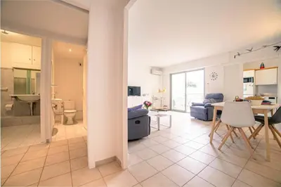 Salle de bains dans l'établissement Les Palmiers