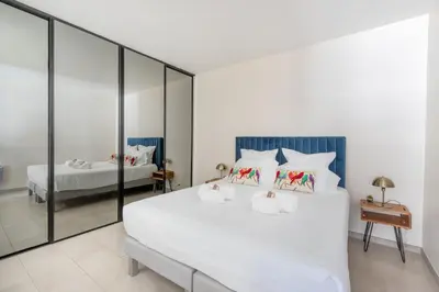 Un ou plusieurs lits dans un hébergement de l'établissement 45 Croisette Apartment - Prime Location - Beach & Palais by Foot - AC