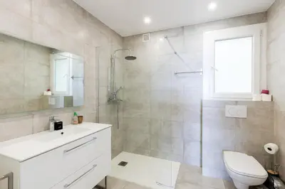 Salle de bains dans l'établissement Palais des Iles YourHostHelper