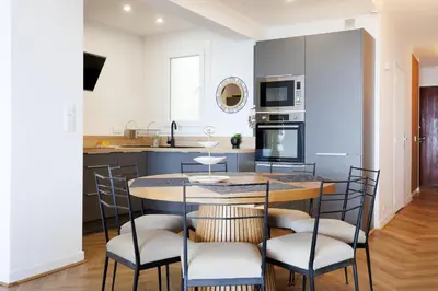 Cuisine ou kitchenette dans l'établissement Palais des Iles YourHostHelper