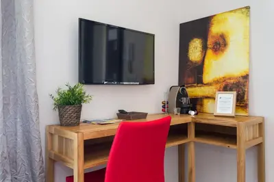 Télévision ou salle de divertissement dans l'établissement Villa Velvet