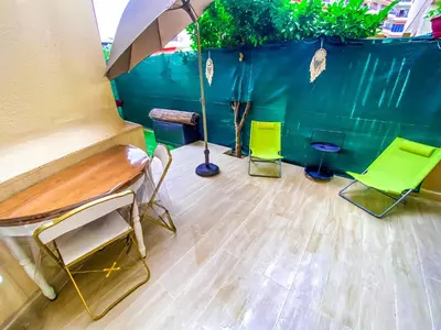 Coin salon dans l'établissement 50m plage - 2 pièces jardin garage