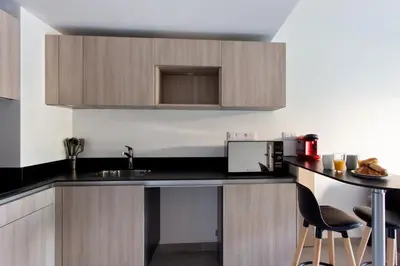 Cuisine ou kitchenette dans l'établissement Appartement Maréchal - Welkeys