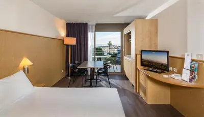 Un ou plusieurs lits dans un hébergement de l'établissement Thalazur Antibes - Résidence & Spa
