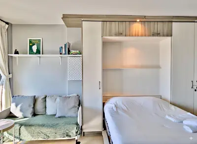 Un ou plusieurs lits dans un hébergement de l'établissement Panoramic Sea View Studio 24h Checkin
