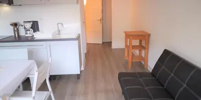 Cuisine ou kitchenette dans l'établissement Résidence Cap Azur Appartement 209