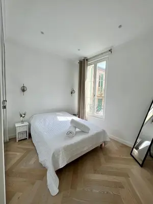 Un ou plusieurs lits dans un hébergement de l'établissement amazing new property in the heart of the old town of antibes