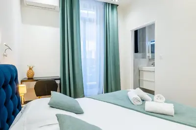 Un ou plusieurs lits dans un hébergement de l'établissement 3-Br Apartment in the heart of downtown