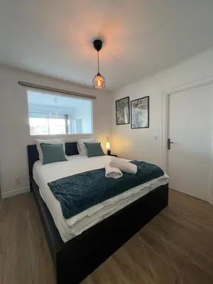 Un ou plusieurs lits dans un hébergement de l'établissement Cosy 2 bedrooms apartment Croisette
