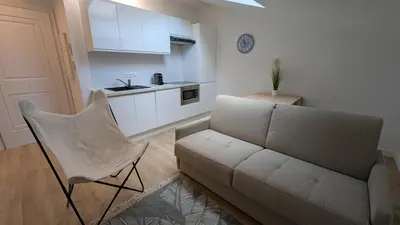 Cuisine ou kitchenette dans l'établissement La Fontaine