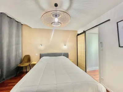 Un ou plusieurs lits dans un hébergement de l'établissement Carré d'or Duplex, by Welcome to Cannes