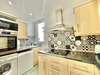 Cuisine ou kitchenette dans l'établissement Carré d'or Duplex, by Welcome to Cannes