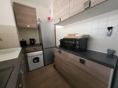 Cuisine ou kitchenette dans l'établissement LE COLOMBIER STUDIO