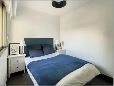 Un ou plusieurs lits dans un hébergement de l'établissement Superbe Appartement 2p avec place de parking