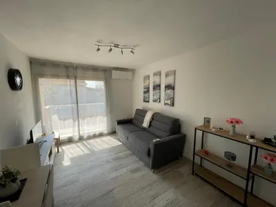 Coin salon dans l'établissement Appartement de charme à 2 min de la plage