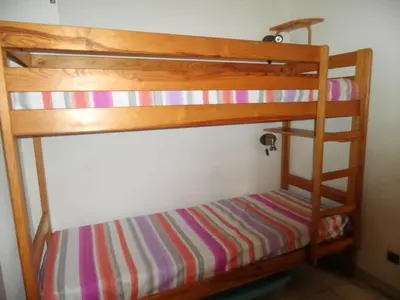 Un ou plusieurs lits superposés dans un hébergement de l'établissement Appartement charmant à Cagnes-sur-Mer - 38 m² - Piscine
