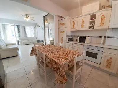 Cuisine ou kitchenette dans l'établissement Palais des Iles