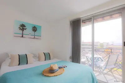 Un ou plusieurs lits dans un hébergement de l'établissement LOFT CROISETTE VUE Mer