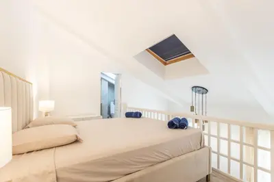 Un ou plusieurs lits dans un hébergement de l'établissement LB Vacation Rentals I Duplex Commandant Andre 65m2 I Casa d'Azur