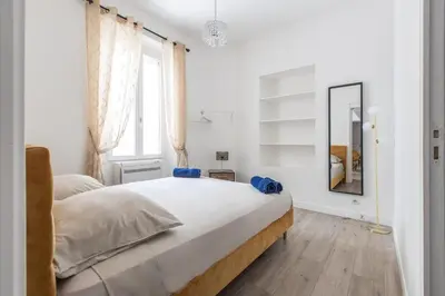 Un ou plusieurs lits dans un hébergement de l'établissement LB Vacation Rentals I Duplex Commandant Andre 65m2 I Casa d'Azur
