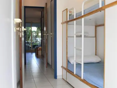 Un ou plusieurs lits dans un hébergement de l'établissement Appartement 3P en RDJ avec Jardin, accès plage direct, 4 à 6 couchages - Villeneuve-Loubet Plage - FR-1-252A-73