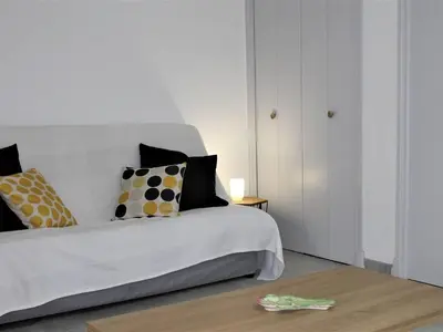 Un ou plusieurs lits dans un hébergement de l'établissement Studio en RDJ avec jardin, plage à 3m, clim et parking, Villeneuve-Loubet - FR-1-252A-74