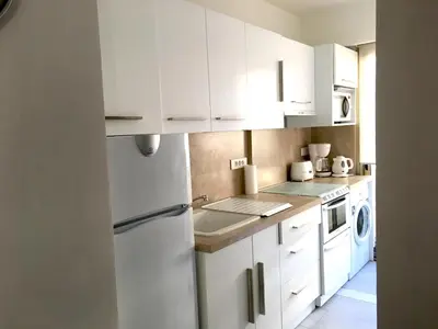 Cuisine ou kitchenette dans l'établissement Palais Lumière