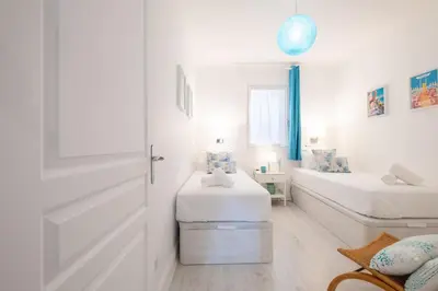 Un ou plusieurs lits dans un hébergement de l'établissement RARE ! Superbe 3 pièces avec jardin face à la mer