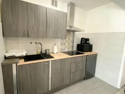 Cuisine ou kitchenette dans l'établissement BEL AIR - Studio, Proche centre, WIFI, Climatisation