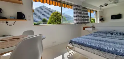 Un ou plusieurs lits dans un hébergement de l'établissement Studio confort ensoleillé - FAME Marina baie des Anges
