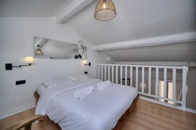 Un ou plusieurs lits dans un hébergement de l'établissement IMMOGROOM - Cosy - Duplex Rénové - Proche des plages