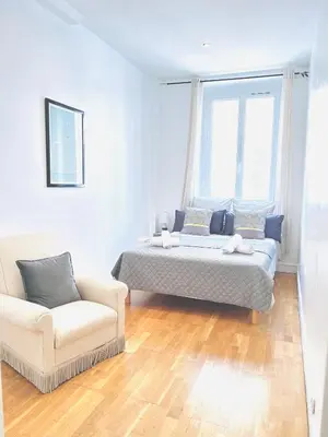 Un ou plusieurs lits dans un hébergement de l'établissement 2 Bedroom flat Cannes Center La Croisette Banane