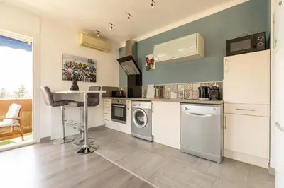 Cuisine ou kitchenette dans l'établissement Hayda - Proche plage et congrès