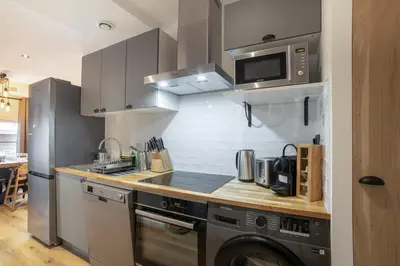 Cuisine ou kitchenette dans l'établissement Charmant Appartement Antibes
