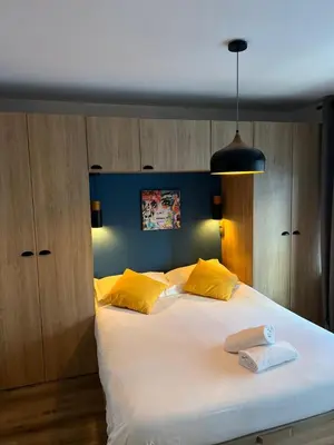 Un ou plusieurs lits dans un hébergement de l'établissement Charmant Appartement Antibes