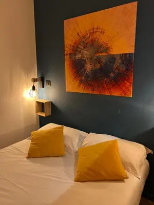 Un ou plusieurs lits dans un hébergement de l'établissement Charmant Appartement Antibes